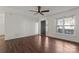 Bright living room features a ceiling fan, a front door, and a window with natural light at 133 Winding Canyon Dr, Charlotte, NC 28214