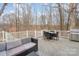 Outdoor deck with comfortable seating, dining area, and stainless steel grill at 140 Melbourne Dr, Fort Mill, SC 29708