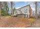 Home exterior featuring a deck and tree-lined yard at 140 Melbourne Dr, Fort Mill, SC 29708