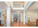 Grand foyer with hardwood floors, soaring ceilings, and elegant architectural columns at 140 Melbourne Dr, Fort Mill, SC 29708