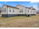 Exterior view of a home, showing well maintained siding and a spacious lawn at 1507 W Davidson Ave, Gastonia, NC 28052