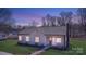 Charming single-story home featuring a well-maintained lawn, sidewalk, and inviting covered porch at 1507 W Davidson Ave, Gastonia, NC 28052