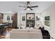 Inviting living room showcasing a brick fireplace, lots of light, and sleek, stylish furniture at 1507 W Davidson Ave, Gastonia, NC 28052