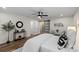 Bedroom with a sliding barn door, wood floors, lots of light, and stylish contemporary decor at 1507 W Davidson Ave, Gastonia, NC 28052