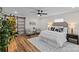 Bedroom with a sliding barn door, wood floors, and contemporary decor at 1507 W Davidson Ave, Gastonia, NC 28052