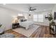 Bright and airy bedroom with stylish decor, wood floors, and great natural light at 1507 W Davidson Ave, Gastonia, NC 28052