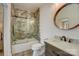 Bathroom features a vanity, a toilet and a shower tub with glass doors at 1547 Sunset Pointe Dr, Salisbury, NC 28146