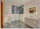 Modern bathroom showcases a glass enclosed shower, floating vanity and an illuminated mirror at 1547 Sunset Pointe Dr, Salisbury, NC 28146