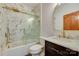 Elegant bathroom with marble tile, glass shower door, and modern fixtures at 1547 Sunset Pointe Dr, Salisbury, NC 28146