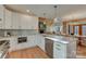 Spacious kitchen with marble countertops, stainless steel appliances, and open concept to the living area at 1547 Sunset Pointe Dr, Salisbury, NC 28146