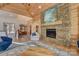 Living room featuring a stone fireplace and wood accents at 1547 Sunset Pointe Dr, Salisbury, NC 28146