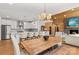 Open living space with kitchen, dining room and living room with fireplace at 1547 Sunset Pointe Dr, Salisbury, NC 28146