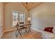 Inviting home office featuring wood accents, natural light, and a comfortable workspace at 1547 Sunset Pointe Dr, Salisbury, NC 28146