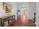 Spacious foyer with hardwood floors and a view of the front door at 15913 Robbins Green Dr, Cornelius, NC 28031