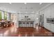 Spacious kitchen with an island, stainless steel appliances, and hardwood floors at 15913 Robbins Green Dr, Cornelius, NC 28031