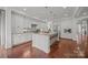 Modern kitchen with a large island, stainless steel appliances, and stylish countertops at 15913 Robbins Green Dr, Cornelius, NC 28031