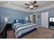 Bright bedroom with a ceiling fan, and large dark-wood dresser at 1796 Williamsburg Dr, Rock Hill, SC 29732