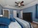 Spacious bedroom featuring a ceiling fan, blue walls and carpeted floors at 1796 Williamsburg Dr, Rock Hill, SC 29732