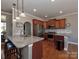 Modern kitchen with stainless steel appliances, granite countertops, and a breakfast bar at 1796 Williamsburg Dr, Rock Hill, SC 29732