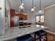 Kitchen featuring granite countertops, stainless steel appliances, and breakfast bar seating at 1796 Williamsburg Dr, Rock Hill, SC 29732