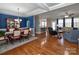 Open-concept living and dining area with hardwood floors and recessed lighting at 1796 Williamsburg Dr, Rock Hill, SC 29732