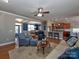 Open living space connecting the living room, dining area, and kitchen with hardwood flooring at 1796 Williamsburg Dr, Rock Hill, SC 29732
