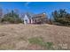 View of the charming outbuilding with covered patio and garage doors at 1796 Williamsburg Dr, Rock Hill, SC 29732