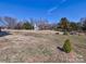 View of the backyard shed with an open porch, offering additional outdoor space at 1796 Williamsburg Dr, Rock Hill, SC 29732