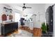 Well lit home office with wood floors, natural light, and closet at 1839 Woodland Dr, Charlotte, NC 28205