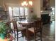 Dining area with deck access, showcasing a cozy table set and decorative elements at 194 Hattaway Cir, Mount Gilead, NC 27306