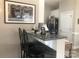 Eat in kitchen featuring bar stool seating, granite countertops, and stainless steel appliances at 194 Hattaway Cir, Mount Gilead, NC 27306