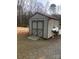 Outdoor storage shed with double doors and space for kayaks and lake toys at 194 Hattaway Cir, Mount Gilead, NC 27306