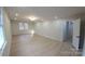 Basement with light wood-look flooring and natural light from windows at 200 Hillcrest Ave, Hickory, NC 28601