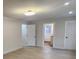 Bedroom with a ceiling fan, light fixtures, and two entrances at 200 Hillcrest Ave, Hickory, NC 28601