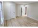 Bedroom with a large window and two closets for storage space at 200 Hillcrest Ave, Hickory, NC 28601