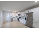 A well-lit kitchen with stainless steel appliances, ample counter space, and modern white cabinets at 200 Hillcrest Ave, Hickory, NC 28601