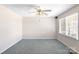 Cozy bedroom with a ceiling fan and a window letting in natural light at 208 Caleb Rd, Shelby, NC 28152