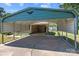 Spacious covered carport offering ample parking and protection from the elements at 208 Caleb Rd, Shelby, NC 28152
