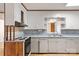 Kitchen featuring white cabinets and blue countertops at 208 Caleb Rd, Shelby, NC 28152
