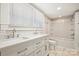 Modern bathroom with dual sink vanity, new fixtures, and a shower-tub combo at 237 Mcneely Ave, Mooresville, NC 28115