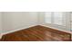 Bright bedroom with hardwood floors, fresh paint, and natural light at 237 Mcneely Ave, Mooresville, NC 28115