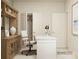 Well-lit home office featuring a work desk, rolling chair, and neutral decor at 2814 Morning Song Way, Lancaster, SC 29720