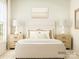 Serene main bedroom with a luxurious bed, side tables, and large windows at 2814 Morning Song Way, Lancaster, SC 29720