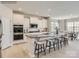 Modern kitchen featuring stainless steel appliances, granite countertops, and seating at the kitchen island at 2817 Morning Song Way, Lancaster, SC 29720