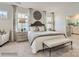 Bright and airy main bedroom with bench and elegant decor, showing a relaxing retreat at 2817 Morning Song Way, Lancaster, SC 29720