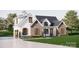 Elegant home featuring a combination of modern design with brick and white siding and an attached garage at 2910A Williams Rd, Matthews, NC 28105