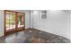 Empty bonus room with stylish flooring and double French doors at 2924 Chelsea Dr, Charlotte, NC 28209