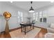 Bright home office with natural light, neutral decor, and wainscotting at 2924 Chelsea Dr, Charlotte, NC 28209