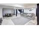 Open-concept basement featuring seating area and game table, perfect for entertainment and relaxation at 308 Dakota St, Kannapolis, NC 28083
