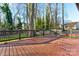 Spacious wooden deck perfect for outdoor living and entertaining with lush green surroundings and natural light at 308 Dakota St, Kannapolis, NC 28083